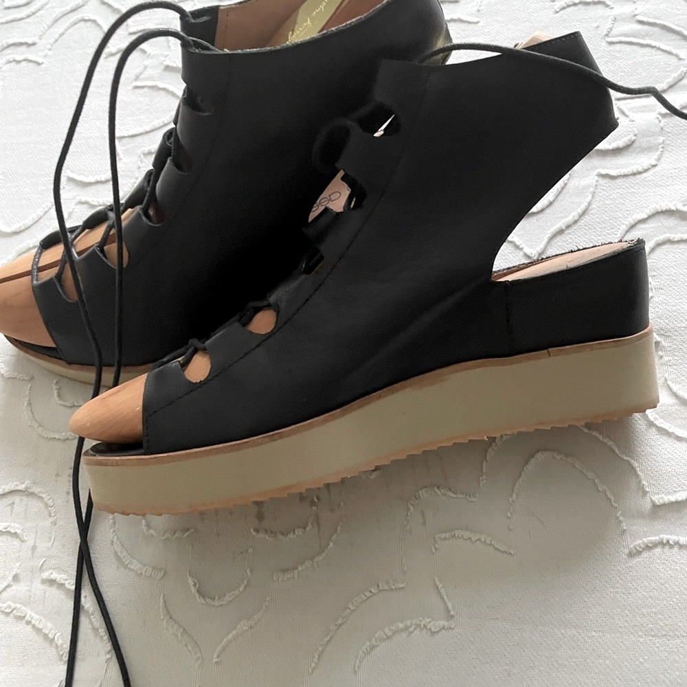 Andre Assous ,open toe lace up sandals , 38 size , worn only one in house .